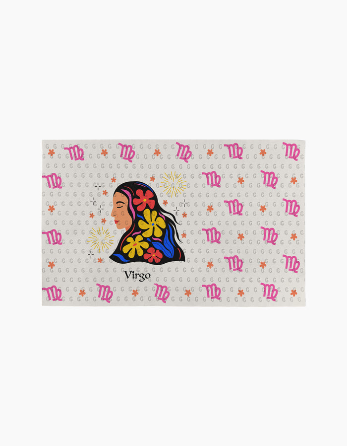 The Clever Virgo mat by Heather Zhou features an illustrated woman's profile with flowers in her hair, Virgo zodiac symbols, and G letters on a white background—ideal for use with reusable paper towels.