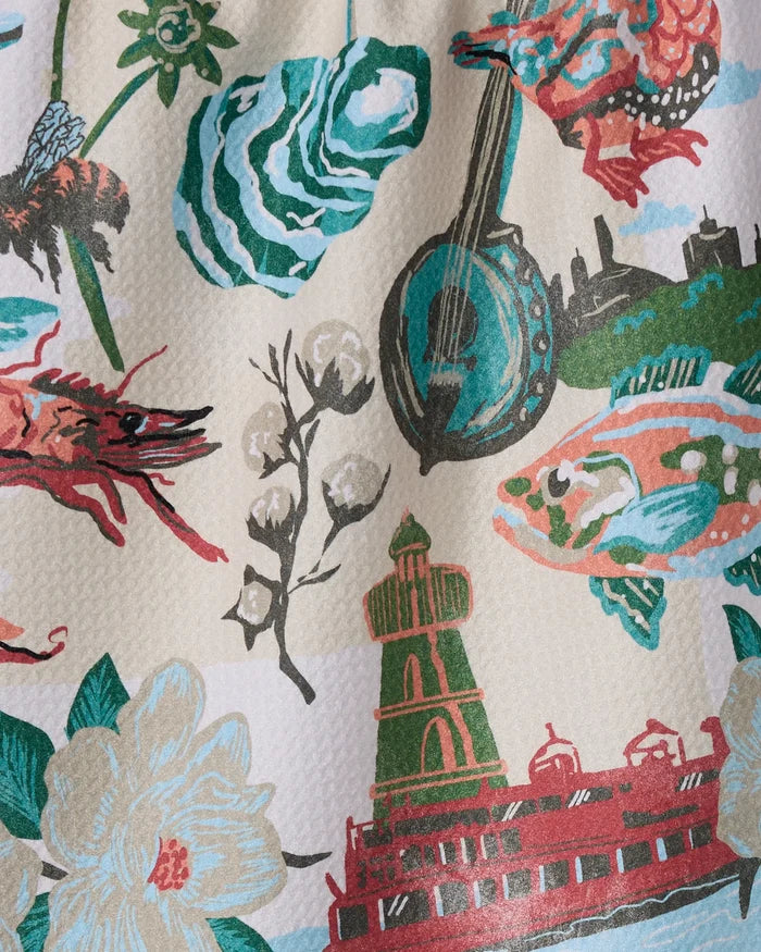 The "Greetings From Mississippi" tea towel by Geometry showcases vibrant state-inspired illustrations and is crafted from ultra-absorbent recycled materials—perfect for adding color and function to your kitchen.