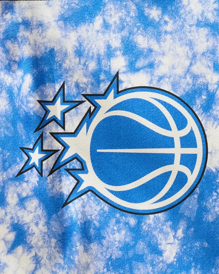The image displays the Magic Flash towel by NBALAB x Geometry, featuring a stylized basketball logo with three stars on a blue and white cloudy background—ideal for NBA fans seeking a stylish fitness accessory.